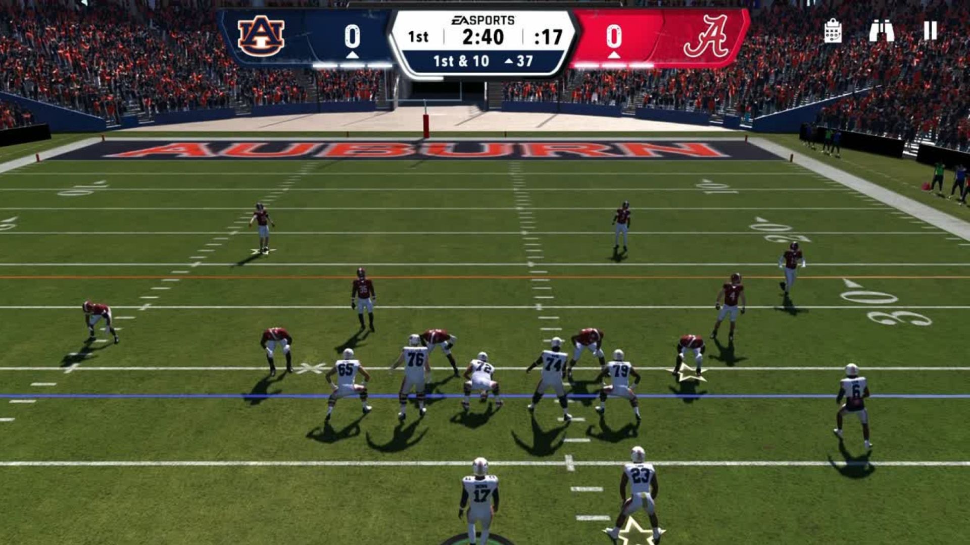 Screenshot from College Football Mobile featuring a game between two teams in a packed stadium.