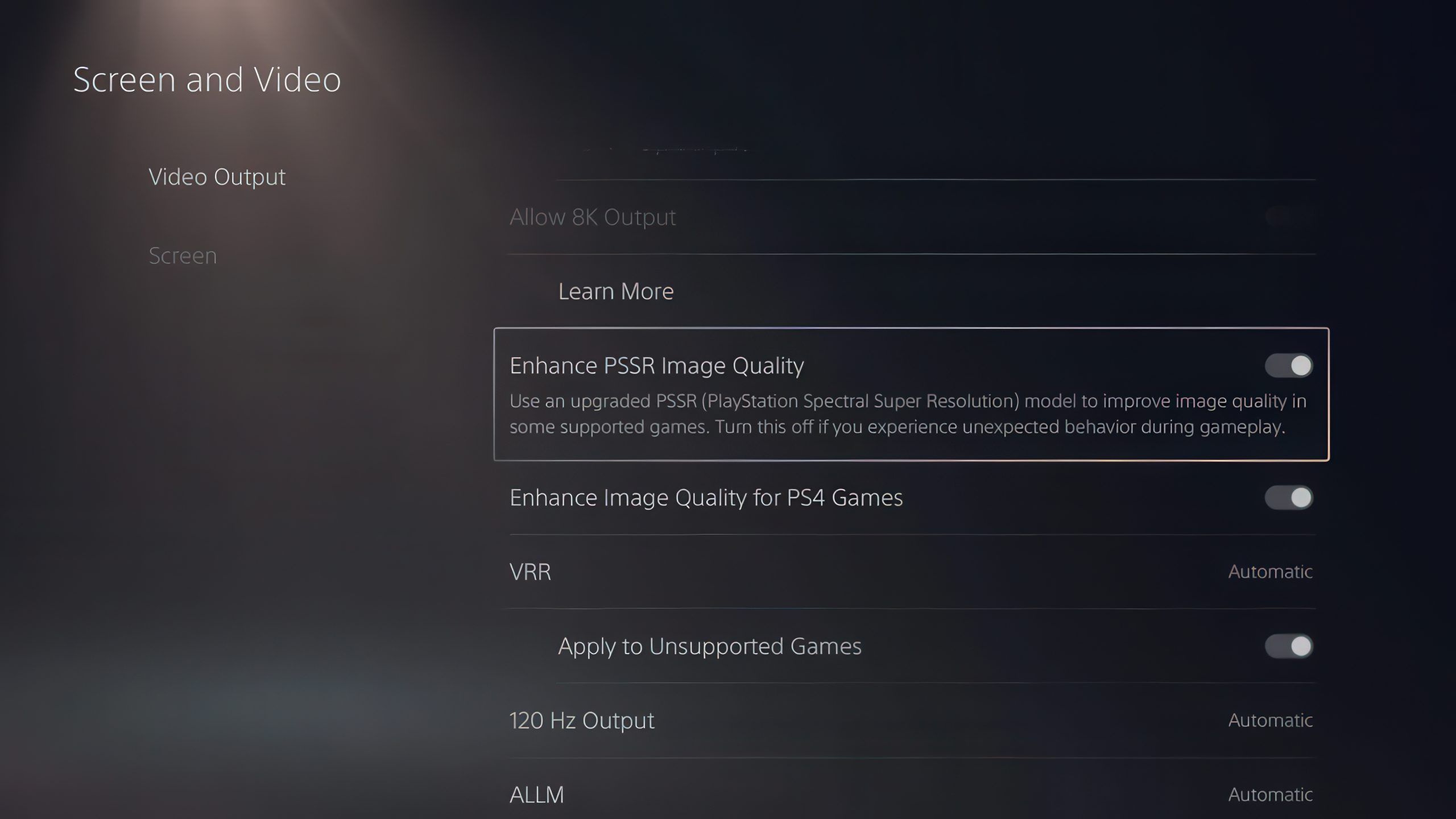 A menu screen titled 'Screen and Video' showing 'Enhance PSSR Image Quality' for PlayStation Spectral Super Resolution, with a toggle option for improving image quality in supported games.